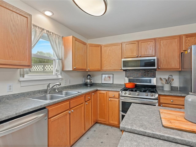 8 Checkerberry Sq Unit 106, Milton, VT 05468 - kitchen with stainless steel appliances, a sink, and light flooring
