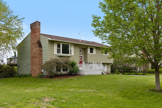 82 Stirrup Cir, Williston, VT 05495 - split foyer home featuring a chimney and a front yard