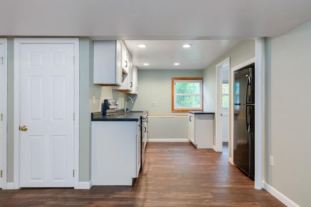 82 Stirrup Cir, Williston, VT 05495 - kitchen with freestanding refrigerator, stainless steel range with electric cooktop, dark countertops, dark wood-style flooring, and recessed lighting