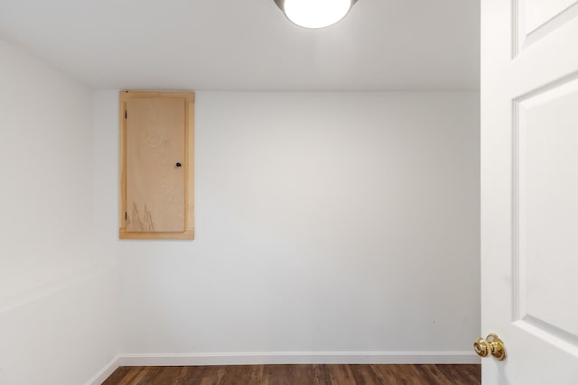 82 Stirrup Cir, Williston, VT 05495 - spare room featuring dark wood-style flooring and baseboards