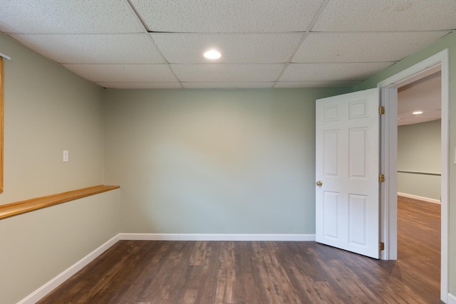 82 Stirrup Cir, Williston, VT 05495 - empty room with dark wood-type flooring, baseboards, a drop ceiling, and recessed lighting