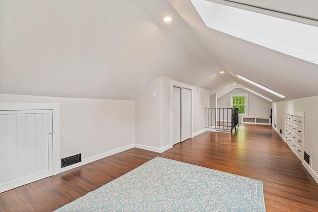 546 Salmon Falls Rd, Rochester, NH 03868 - bonus room featuring lofted ceiling, hardwood / wood-style floors, baseboards, and recessed lighting