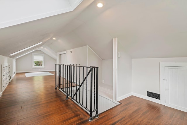 546 Salmon Falls Rd, Rochester, NH 03868 - bonus room with lofted ceiling, hardwood / wood-style flooring, and baseboards