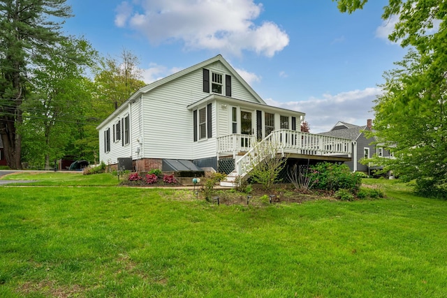 546 Salmon Falls Rd, Rochester, NH 03868 - rear view of house featuring a wooden deck, a lawn, and stairway