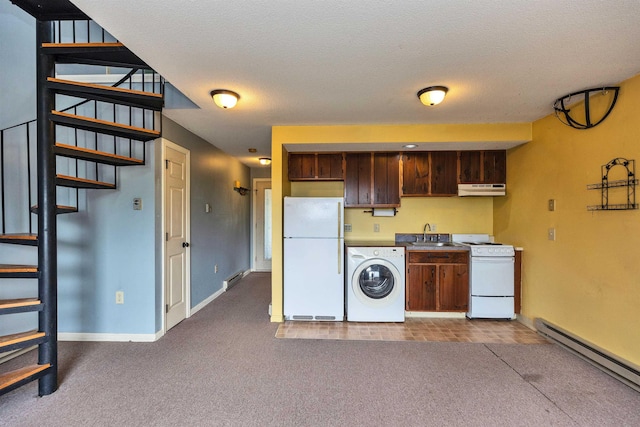 10 Onset Rd Unit 9A, Bennington, NH 03442 - kitchen with white appliances, washer / dryer, baseboard heating, under cabinet range hood, and a sink