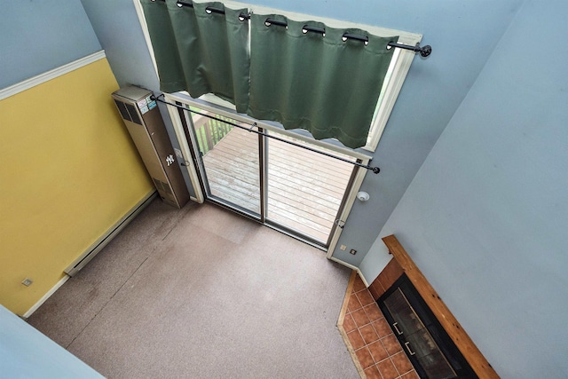 10 Onset Rd Unit 9A, Bennington, NH 03442 - interior space with a fireplace, a baseboard heating unit, carpet, and baseboards