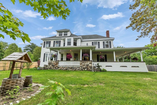 120 S Mast St, Goffstown, NH 03045 - rear view of house featuring a chimney and a porch