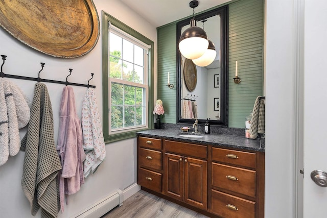 120 S Mast St, Goffstown, NH 03045 - bathroom with vanity, wood finished floors, and baseboards