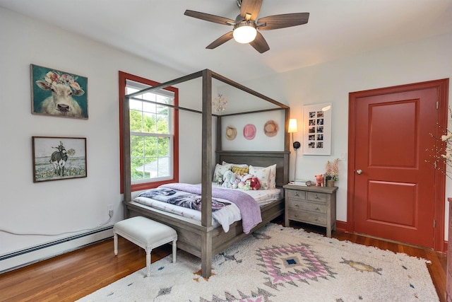 120 S Mast St, Goffstown, NH 03045 - bedroom featuring wood finished floors, a baseboard heating unit, and ceiling fan
