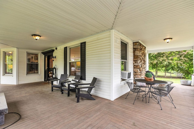 120 S Mast St, Goffstown, NH 03045 - porch featuring outdoor dining area and cooling unit