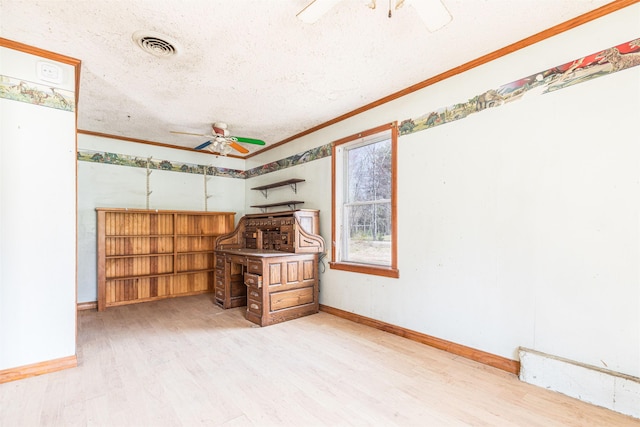 383 Greenhill Rd, Barrington, NH 03825 - below grade area with ceiling fan, light wood finished floors, ornamental molding, baseboards, and a textured ceiling
