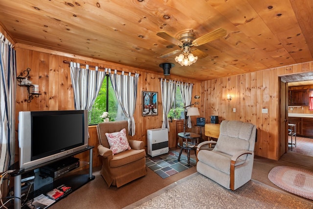 50 Browns Beach Rd, Bristol, NH 03222 - living room with wooden ceiling, wood walls, a ceiling fan, and heating unit