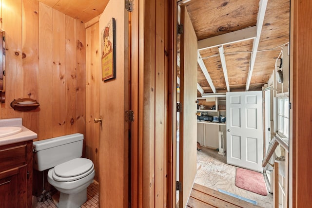 50 Browns Beach Rd, Bristol, NH 03222 - bathroom with vanity, toilet, wood ceiling, and wood walls