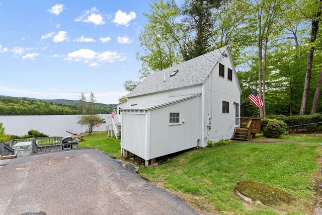 50 Browns Beach Rd, Bristol, NH 03222 - garage with a water view