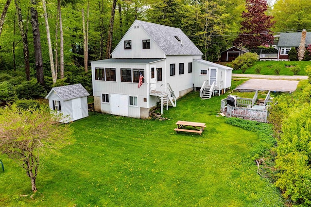 50 Browns Beach Rd, Bristol, NH 03222 - rear view of house with stairs, a yard, and roof with shingles