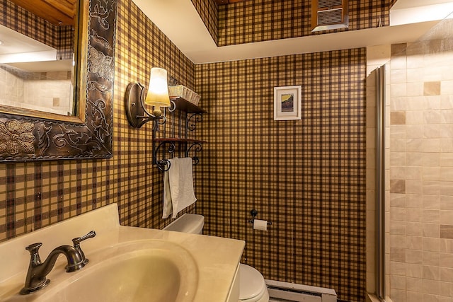 46 Murray Hill Heights Rd Unit 17, Manchester, VT 05255 - bathroom featuring a baseboard radiator, toilet, wallpapered walls, a shower, and vanity