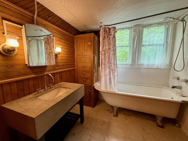927 Water St, Bennington, VT 05257 - full bathroom featuring wood ceiling, vanity, wood walls, marble finish floors, and shower / tub combo with curtain