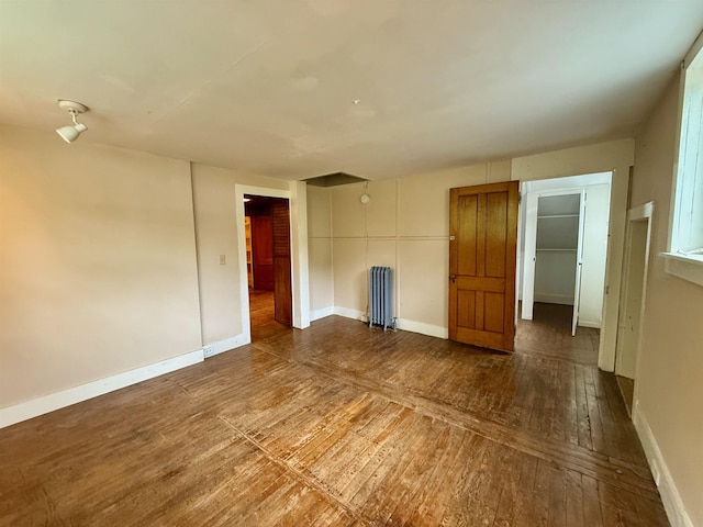 927 Water St, Bennington, VT 05257 - spare room featuring radiator heating unit, hardwood / wood-style floors, and baseboards
