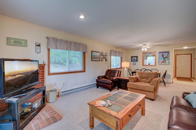 22 Northbrook Cir Unit 12, Conway, NH 03860 - carpeted living room with a baseboard heating unit, ceiling fan, and recessed lighting