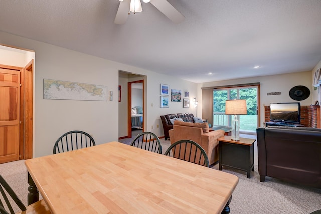 22 Northbrook Cir Unit 12, Conway, NH 03860 - dining room featuring light colored carpet and ceiling fan
