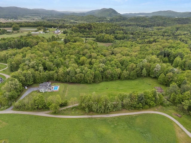55 Honey Hill Rd, Hinesburg, VT 05461 - drone / aerial view of a heavily wooded area and a mountainous background