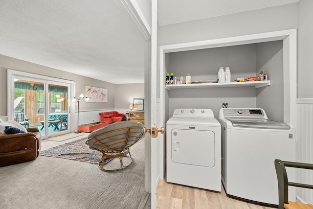 55 Honey Hill Rd, Hinesburg, VT 05461 - washroom featuring washer and clothes dryer, light wood-style flooring, and a textured ceiling