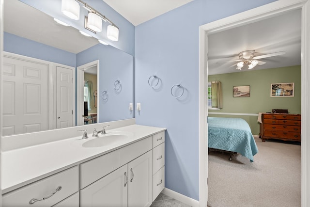 55 Honey Hill Rd, Hinesburg, VT 05461 - ensuite bathroom featuring vanity, a ceiling fan, and baseboards