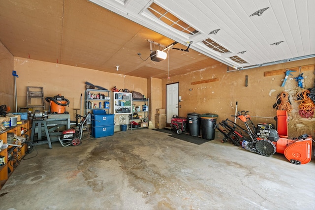55 Honey Hill Rd, Hinesburg, VT 05461 - garage featuring a workshop area and a garage door opener