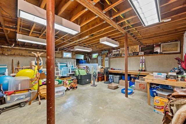 55 Honey Hill Rd, Hinesburg, VT 05461 - unfinished below grade area with electric panel and a workshop area