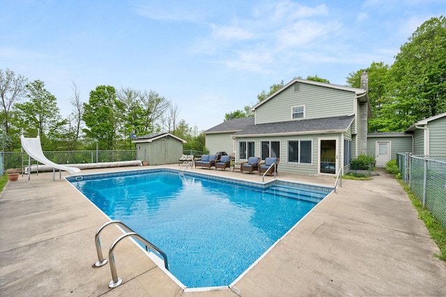 55 Honey Hill Rd, Hinesburg, VT 05461 - view of pool with a water slide, a fenced backyard, a patio area, and outdoor lounge area