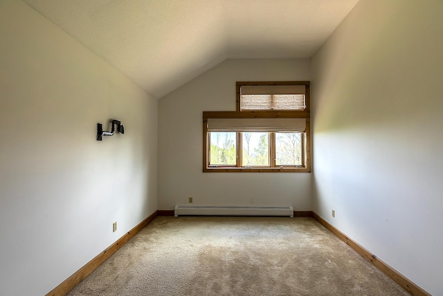 46 Willows Way Unit 5, Peru, VT 05152 - additional living space with carpet floors, a baseboard radiator, baseboards, and lofted ceiling