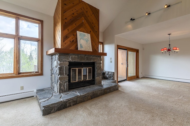46 Willows Way Unit 5, Peru, VT 05152 - unfurnished living room featuring carpet floors, healthy amount of natural light, a stone fireplace, and high vaulted ceiling
