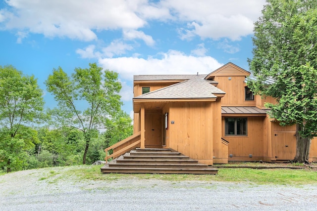 46 Willows Way Unit 5, Peru, VT 05152 - view of front of house with a standing seam roof, metal roof, and a shingled roof