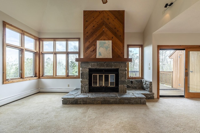 46 Willows Way Unit 5, Peru, VT 05152 - unfurnished living room with carpet flooring, vaulted ceiling, a fireplace, and a baseboard heating unit