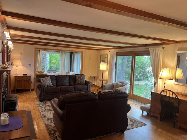 87 Chase Point Rd, Tuftonboro, NH 03853 - living area with beamed ceiling and wood finished floors