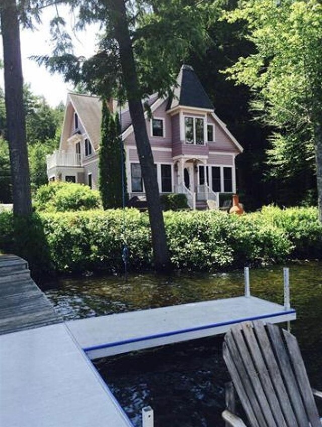 34 Baker Ave, Deerfield, NH 03037 - view of front of house with a dock and a water view