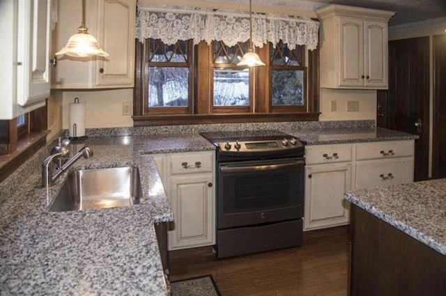 34 Baker Ave, Deerfield, NH 03037 - kitchen with electric stove, a sink, light stone counters, pendant lighting, and dark wood finished floors