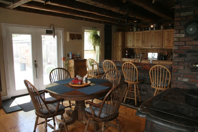 1083 Back Center Rd, Lyndon, VT 05851 - dining area featuring beam ceiling, french doors, and light wood-style flooring