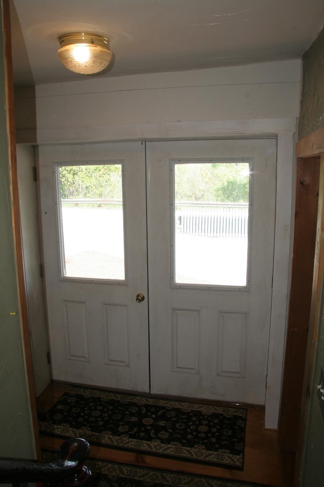 1083 Back Center Rd, Lyndon, VT 05851 - entrance foyer featuring healthy amount of natural light and french doors