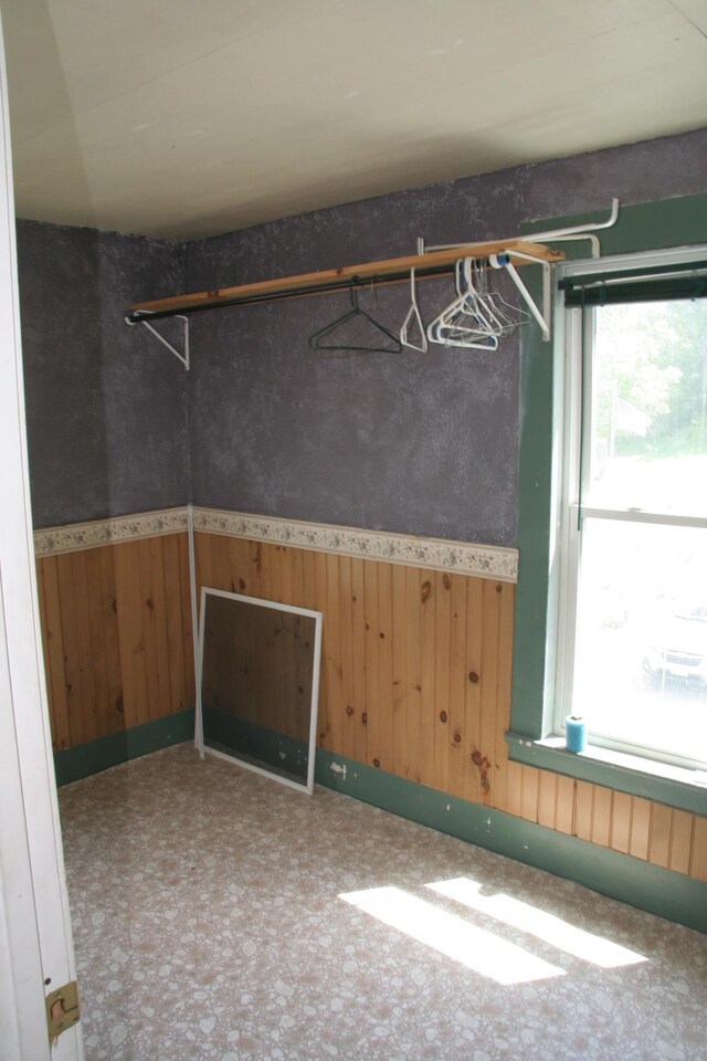 1083 Back Center Rd, Lyndon, VT 05851 - unfurnished room with a wainscoted wall and wood walls