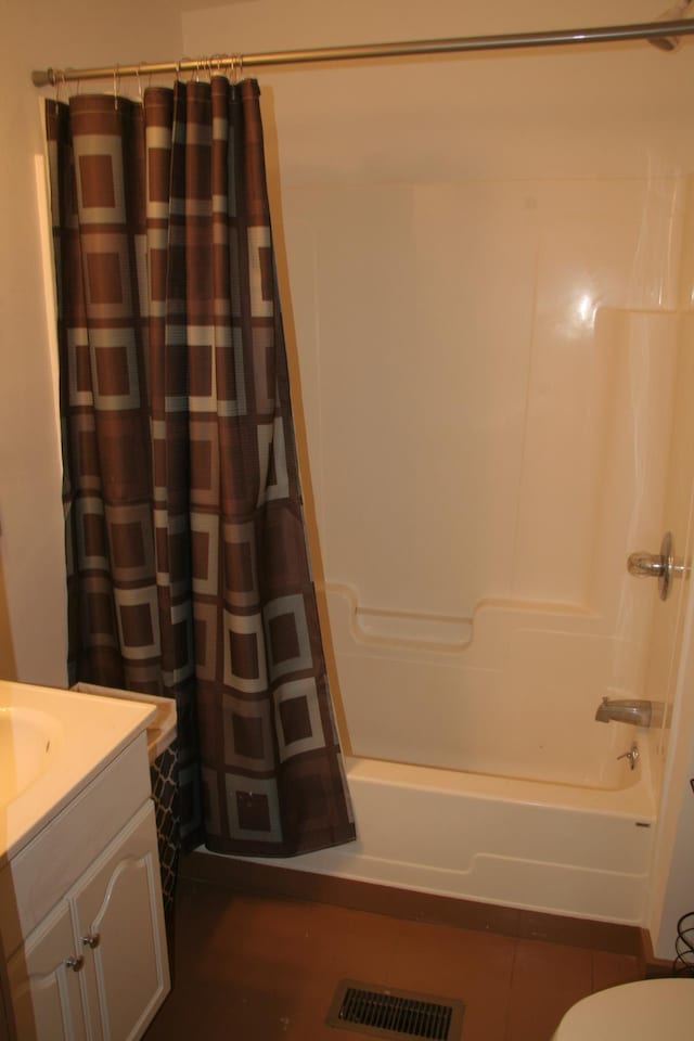1083 Back Center Rd, Lyndon, VT 05851 - full bath featuring vanity, shower / bath combination with curtain, and toilet
