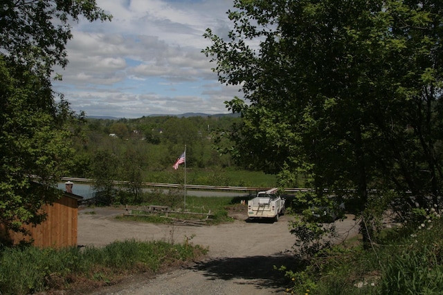 1083 Back Center Rd, Lyndon, VT 05851 - view of street featuring a view of trees