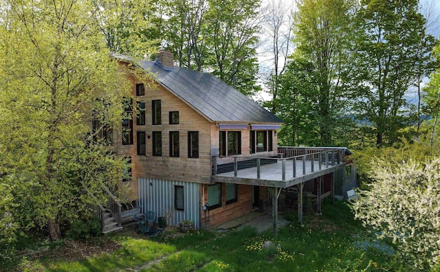 304 Green Bay Loop, Peacham, VT 05862 - back of house with a deck, a chimney, and stairs