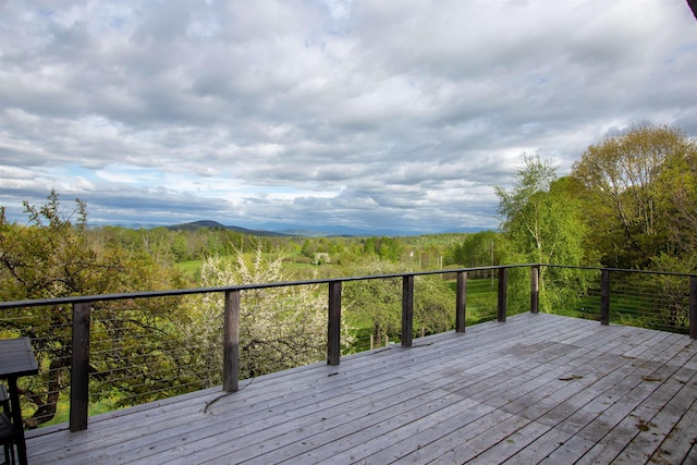 304 Green Bay Loop, Peacham, VT 05862 - wooden terrace featuring a forest view