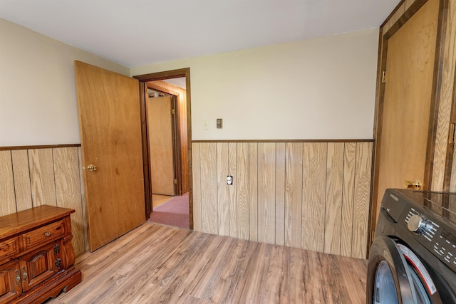 124 Hanson Rd, Ossipee, NH 03864 - washroom with a wainscoted wall, washer / clothes dryer, wood finished floors, and wooden walls