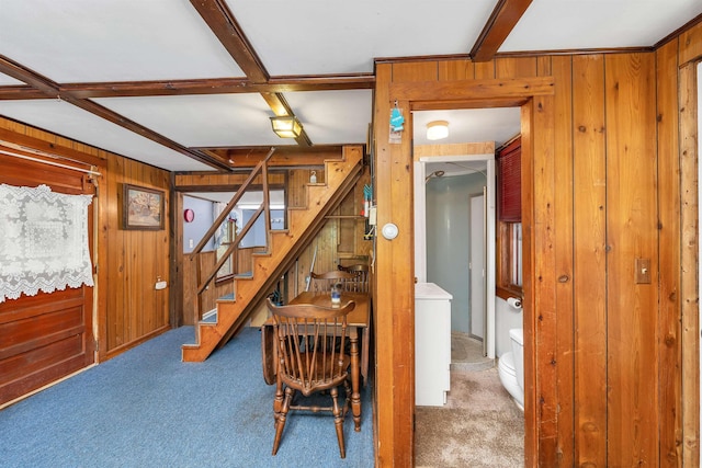 124 Hanson Rd, Ossipee, NH 03864 - dining area featuring carpet, wood walls, stairs, and beamed ceiling