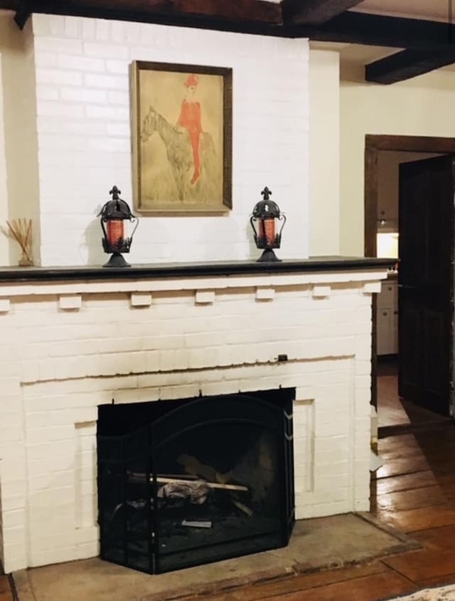 1186 Pucker St Unit 1.5Acres, Stowe, VT 05672 - detailed view of a fireplace, wood finished floors, and beam ceiling