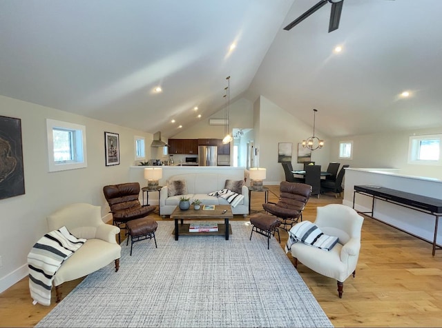 1186 Pucker St Unit 1.5Acres, Stowe, VT 05672 - living room with light wood finished floors, vaulted ceiling, baseboards, a chandelier, and recessed lighting