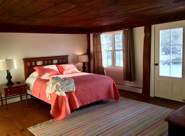 1186 Pucker St Unit 1.5Acres, Stowe, VT 05672 - bedroom featuring a baseboard radiator, multiple windows, wooden ceiling, and wood finished floors