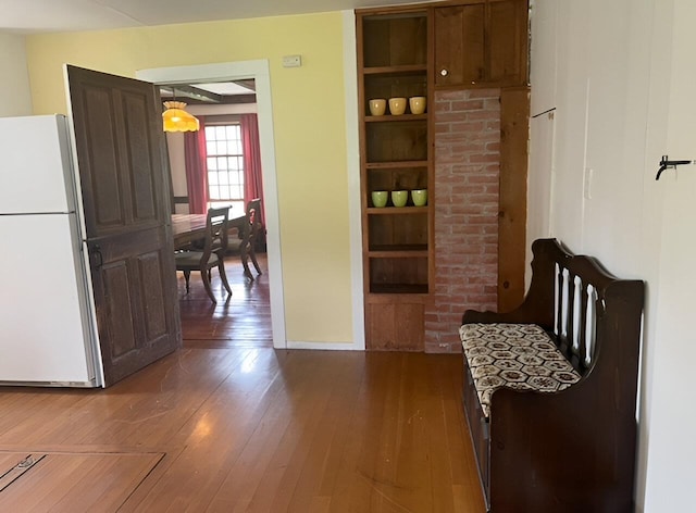1186 Pucker St Unit 1.5Acres, Stowe, VT 05672 - corridor with wood-type flooring and built in shelves